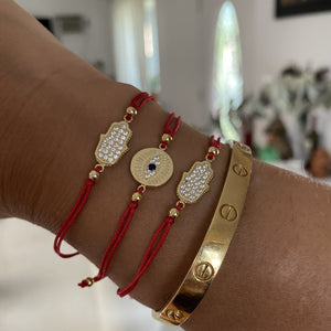 Cartier love bracelet red string 2025
